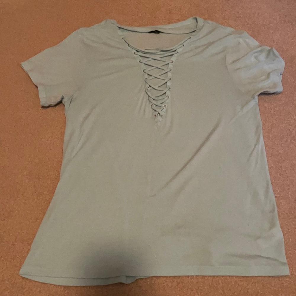 Blue top with crisscrossed detail